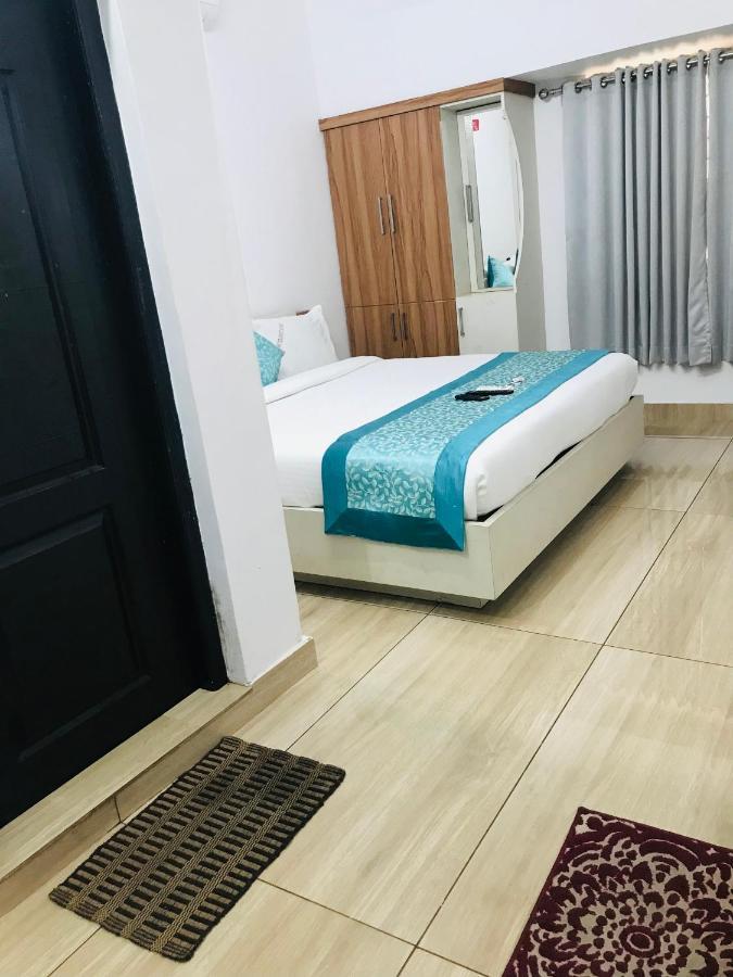 Lakshmi Tourist Home Гуруваюр Экстерьер фото